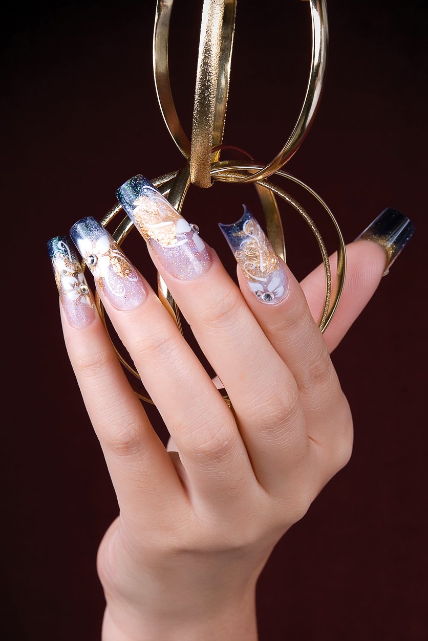 a woman's nail, designed with nail art